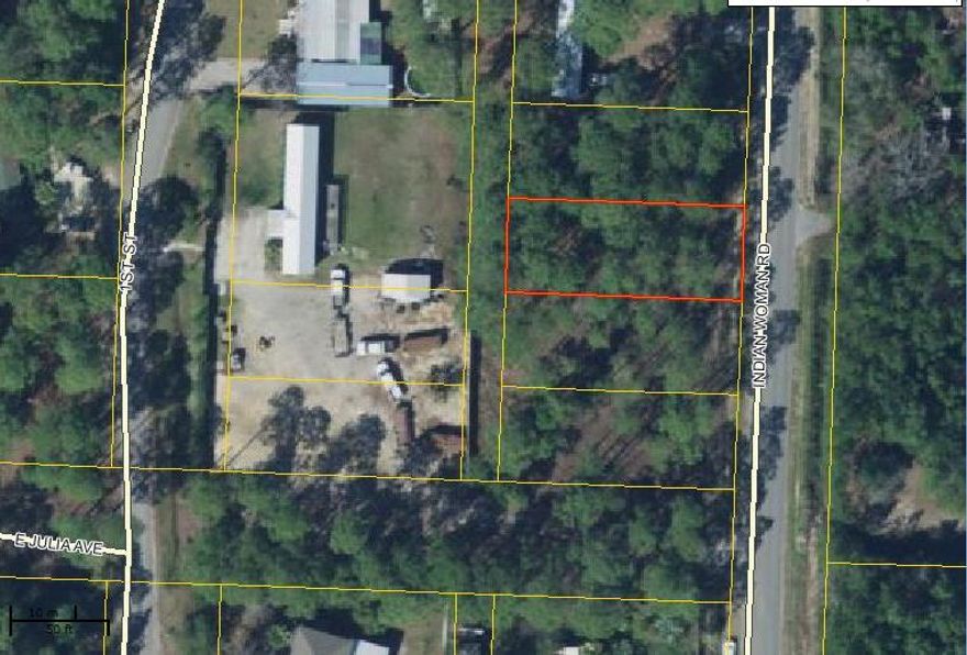 lot 10 located in North Santa Rosa Beach FL on a paved road with water and sewer available (tap fees not paid). Bush Hogged 1 year ago. Survey available. Additional land available. Buyer should verify all measurements.