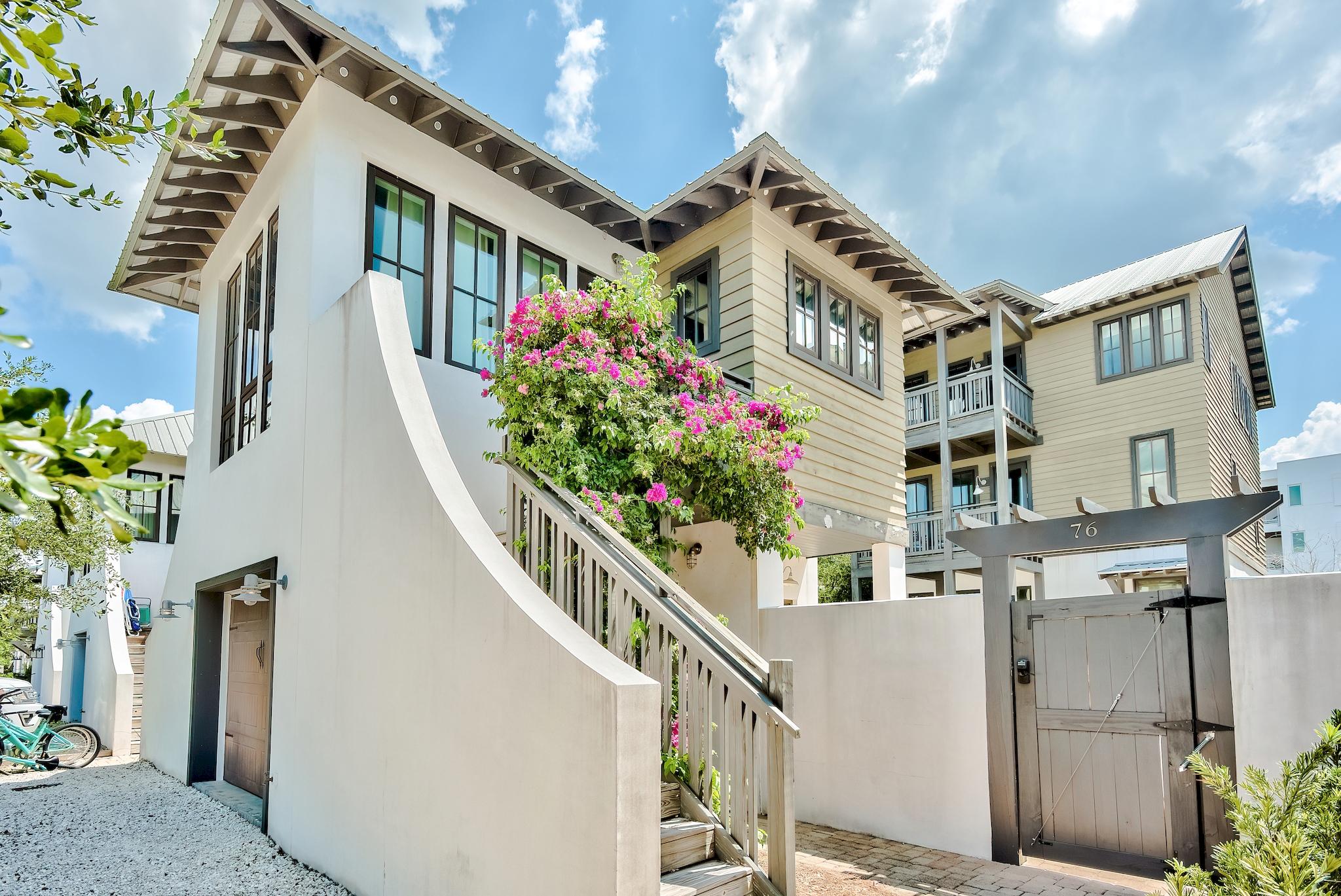 Perfectly situated on the eastern border of Rosemary Beach, 76 N Winston Lane is primely located in the heart of East 30A. This sublime location, overlooking the Rosemary Beach tennis courts, offers easy access to the sugar white sandy beach as well as the shopping and dining within Rosemary and 30Avenue. Interior is Newly renovated with hardwood floors in Sept. 2020, completely refurnished with in-trend design throughout, new AC 2021 for carriage house, professionally re-landscaped,. The well thought-out floor plan  showcases 5 bedrooms and 5.5 bathrooms.  Features of the home include a private pool, self-contained carriage house, fireplace, chef's kitchen, designer finishes and luxury features. No HOA to pay so its a perfect investment property, second home or permanent residence