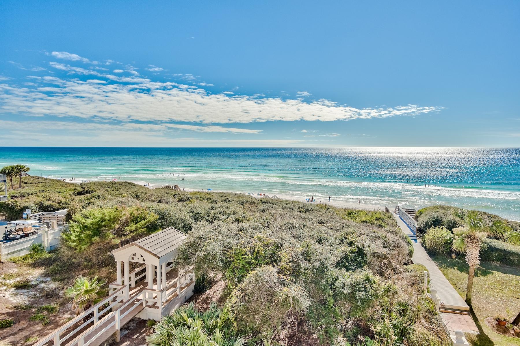 Updated gulf front Seagrove cottage with 57 feet of stunning beach frontage. With direct boardwalk access, meander through a secluded tree arbor atop a high dune. Below you'll find a quieter beach with plenty of room on the sand. A fresh updated renovation has just been completed for summer of 2022. All new furnishings and a coastal contemporary look make this a great family getaway on a quiet beach. Seaside is an easy bike ride. This convenient location is centrally located to all of 30-A. This delightful floor plan provides four bedrooms, which includes a bonus sleeper room. Immerse yourself in sensational Gulf views from the second floor living-kitchen-dining area. The third floor master suite and large master bath capture the sparkling white sandy beach below.