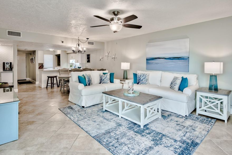 This is the definition of a TURN-KEY property! As the #1 reviewed rental unit in Mainsail, this professionally decorated 3rd floor unit features wonderful views of the Gulf from the balcony along with a view of the pool area. With direct beach access, a gulf front community pool and convenient beach service, you won't have to lift a finger! Enjoy the numerous upgrades this beach getaway has to offer, highlighted by a 25-pound ice maker, flat-screen HDTV's in both bedrooms, and two king beds as well as a Murphy bed system. This is the perfect spot to bring the whole family!  Spectacular shopping across the street and dining options are nearby along with grocery and a pharmacy located outside the gates of this complex. Come show today!