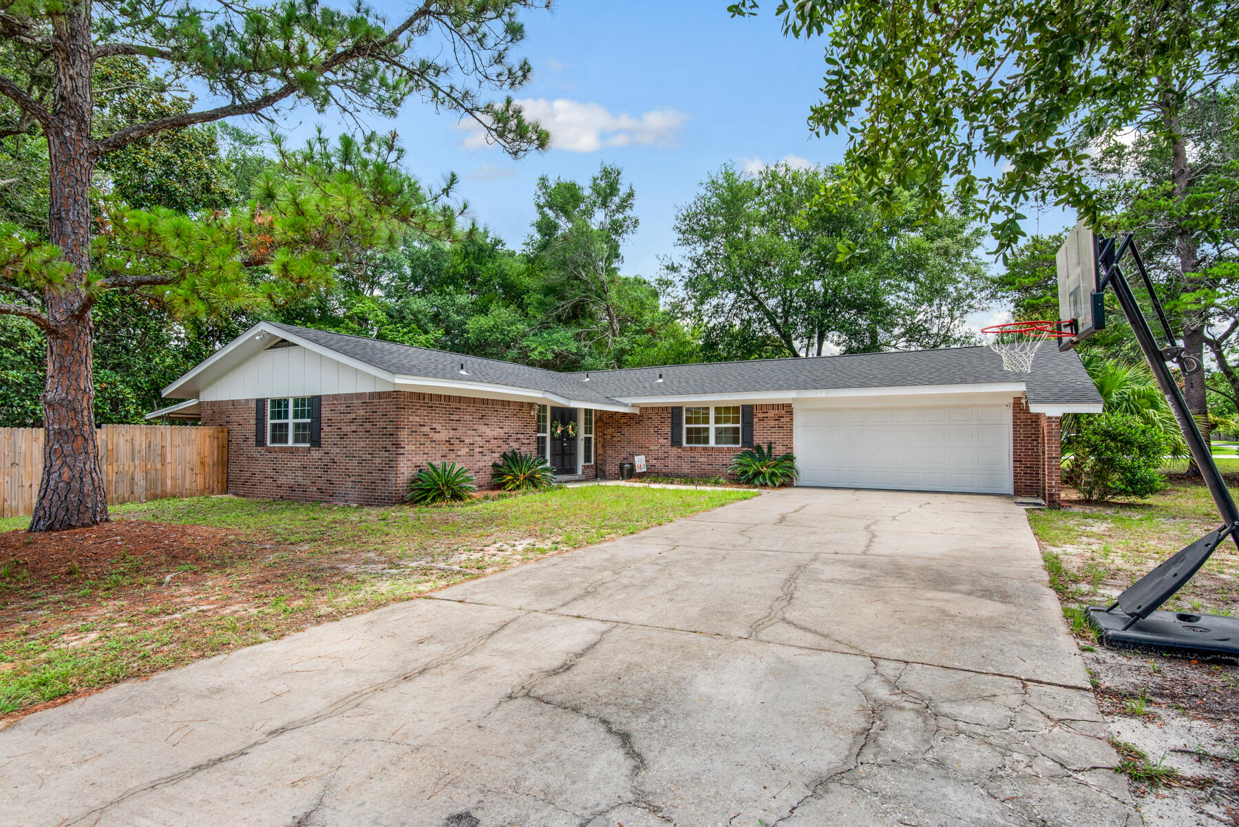 Spacious 4 bedroom home located on a corner lot tucked away in the Poquito Bayou neighborhood! Your home has a nice pass thru kitchen, breakfast bar, tile floors, wood burning fire place, carpet in the bedrooms and a covered back porch. And the owner will take cats and dogs! (non-aggressive breeds). All Coastal Realty Services residents are enrolled in the Resident Benefits Package (RBP) which includes renters insurance, HVAC air filter delivery (for applicable properties) and our best-in-class resident rewards program, and much more! More details upon application.