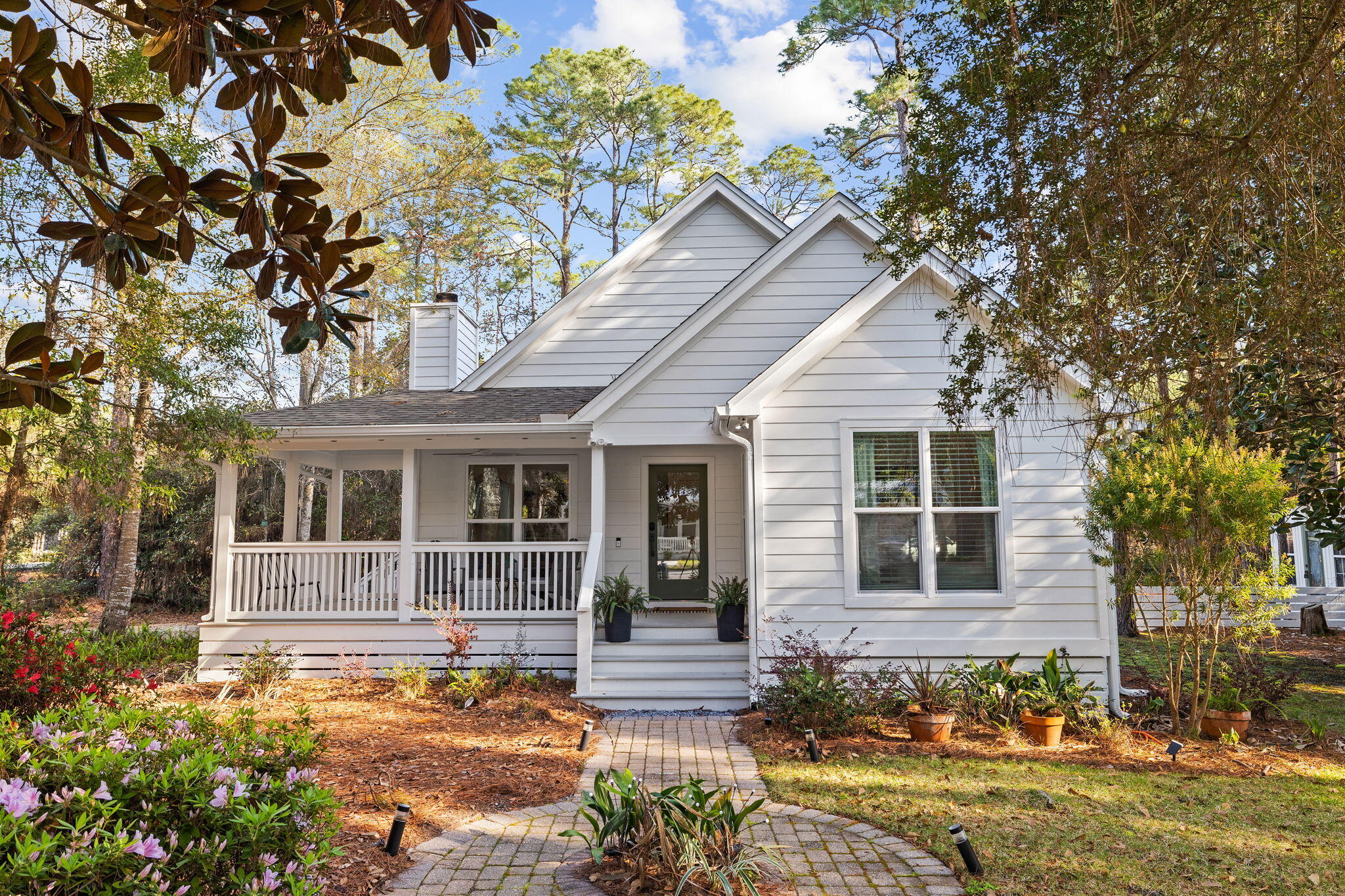 Uniquely positioned on *TWO LOTS (LOTS 37,38 Magnolia Beach)*, This charming cottage is not just a serene sanctuary but also a testament to the area's appeal, boasting an impressive short-term gross rental history with over $80,000 in Airbnb revenue in 2023 alone.Discover Why Everyone Loves Point Washington, FL! Surrounded by towering trees and a stone's throw from the Choctawhatchee Bay, the home offers peace and privacy on an unparalleled scale. The screened porch and wrap-around balcony serve as your personal havens, where the natural beauty of dawn transforms into starlit evenings, encapsulating the essence of Point Washington's timeless allure.Extensive renovations have meticulously