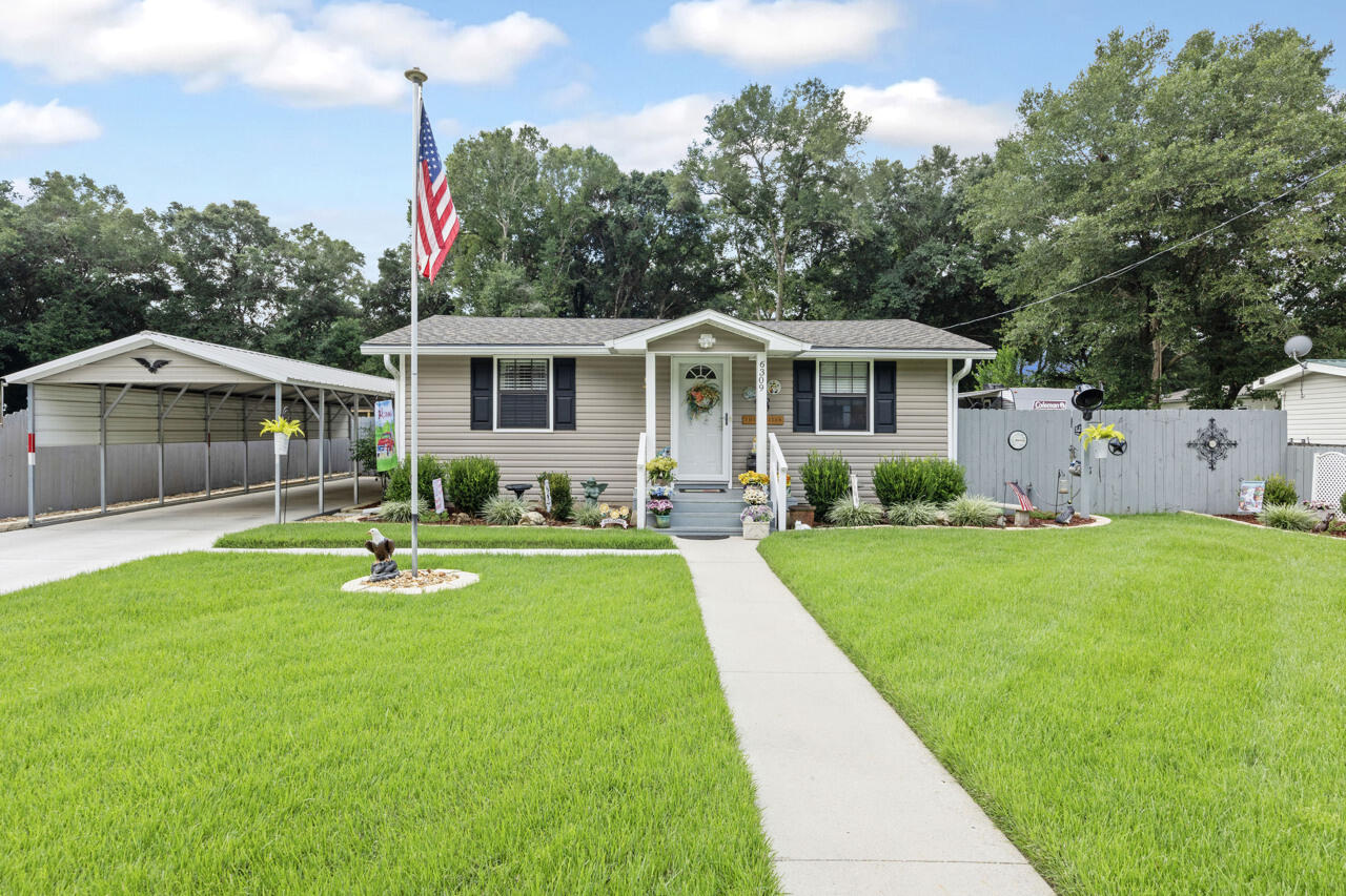 This well maintained home is ready for you to move right in! The owner has taken incredible care of the landscaping and it is truly a property to be proud of. Interior features include: Tile flooring (no carpet!) ceiling fans, extra closet space, solid surface countertops, tile shower in main bathroom, interior washer and dryer hookup, dining area and a breakfast bar. The 12'x12' screened in porch is off of the main bdrm, and the open deck off of the kitchen has gas line hook up for your grill! Additional property features include: 40' carport, whole house gutters, whole house plumbed for gas, privacy fenced back yard, PLUS an additional sectioned off property in the rear with fencing. The shed in the backyard is perfect for your tools and has 2 20AMP breakers. Roof 2019, HVAC 2022, WH 16