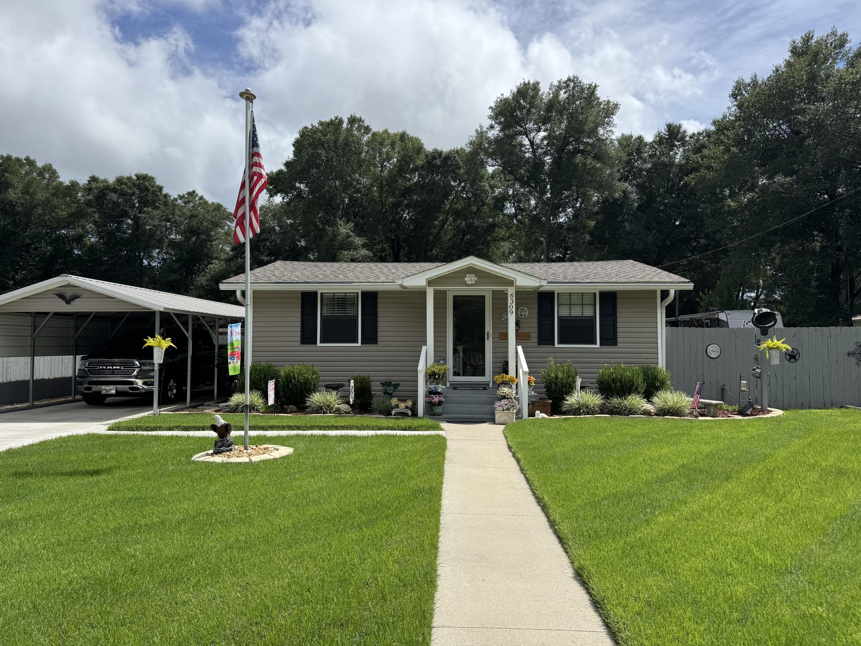 This well maintained home is ready for you to move right in! The owner has taken incredible care of the landscaping and it is truly a property to be proud of. Interior features include: Tile flooring (no carpet!) ceiling fans, extra closet space, solid surface countertops, tile shower in main bathroom, interior washer and dryer hookup, dining area and a breakfast bar. The 12'x12' screened in porch is off of the main bdrm, and the open deck off of the kitchen has gas line hook up for your grill! Additional property features include: 40' carport, whole house gutters, whole house plumbed for gas, privacy fenced back yard, PLUS an additional sectioned off property in the rear with fencing. The shed in the backyard is perfect for your tools and has 2 20AMP breakers. Roof 2019, HVAC 2022, WH 16