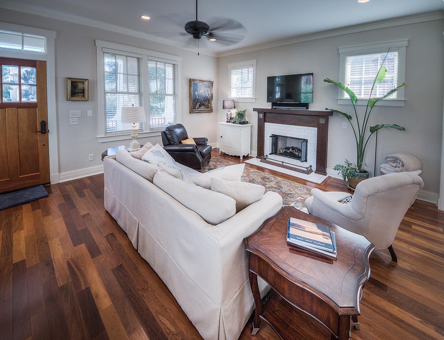 SELLER TO PROVIDE BUYER WITH A FULL GOLF MEMBERSHIP TO SHARKS TOOTH AND CAMP CREEK (INCLUDES ACCESS TO WATERSOUND BEACH CLUB) WITH THE PURCHASE OF THE HOME! This beautiful coastal craftsman style bungalow, includes 3 bedrooms and 3 baths in the gorgeous golf community of Wild Heron. The homes exterior has been completely repainted along with new landscaping. The interior upgrades include custom closets and shelving, crown molding, beautiful hardwood floors, new tile around the gas fireplace, new window treatments and a tankless hot water heater. In the kitchen a new stone backsplash has been installed along with custom black walnut counter on the kitchen island.