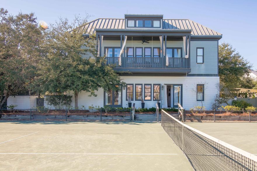 Old world charm meets modern sensibility in this exquisite renovation. 5 BR (plus loft) / 5 BA home and carriage house. Situated fronting the tennis courts on one of the main boardwalks that leads totheo of Rosemary Beach's four pools, Eastern Green and beach, location is ideal. An oversized lot provides the setting for a beautiful private brick courtyard and lawn with ample space for both the main and carriage houses to enjoy, not often found in Rosemary Beach. A wonderful built in seating area with fire pit is located at one end of lawn. Entering the the main house from the courtyard you find a sunroom style kitchen and dining room, enhanced by charming ten foot heart pine doors that let outdoor beauty shine in. A brick wall, concrete floors, granite countertops, 11 foot ceilings,