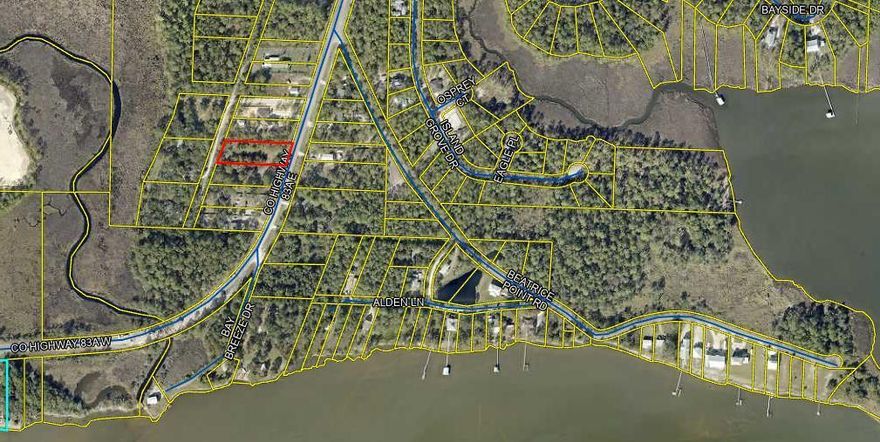 INTRIGUING LOT and LOCATION!  Unrestricted, over 3/4 Acre Lot, City Water & Sewer Taps PAID, two accesses/entrances & partially fenced.  Lot width is approx. 112' wide which helps when building larger floor plans or single story homes. There are many new homes being built along County Hwy 83-A & various subdivisions. The Walk-Bike Path at your driveway is convenient & a Bonus!  Bear Creek Bridge on 83-A is just around the curve. Partially cleared lot with Oaks and Palmettos. Seller may consider Owner Financing with a large down payment & short-term balloon to qualified Buyer. Easy access to Schools, Publix, Restaurants & The Shoppes of Freeport - all can be accessed off of Hwy 20. If in the market for a unique site for your new home, take a look at the special advantages this Lot offers