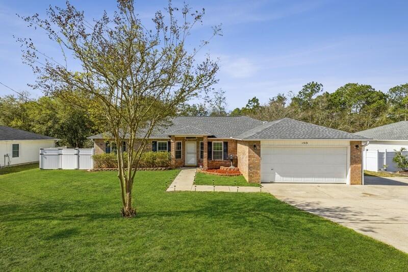 BACK ON THE MARKET! Zero fault of sellers!MULTIPLE OFFERS RECEIVED! All offers due by 6pm 4/12.Welcome Home to this meticulously maintained & updated home in SOUTH Crestview! Perfect for Florida outdoor entertaining!A quick commute to all the local bases! Featuring 4 bedrooms, 2 full bathrooms, 1,922 sq. ft. with a split floor plan design!Upon arrival, you a greeted by an extra wide driveway! Great for a boat or camper! Walking into the home, you will find a tiled foyer & formal dining/office space. An inviting living room also connects you to your outdoor living space! Enjoy your morning coffee on your 19' x 10' screened-in patio & summer BBQ's & cool evening roasting smores under your string light lit pergola. A private tree lined backyard with a large shed for outdoor storage.