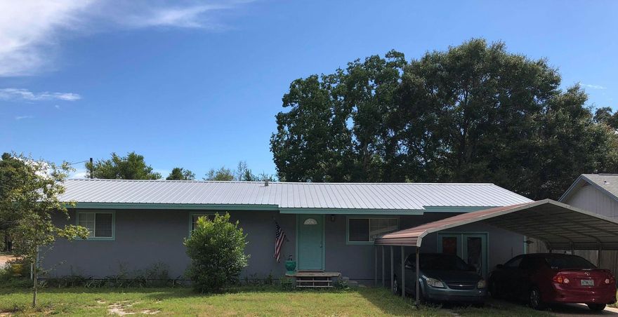 One of the mot desired neighborhoods in Fort Walton Beach..and its a Corner Lot! Only 18 minutes to each air force bases. Great big open kitchen to entertain guests and family. This 3 bedroom 2 bath has a huge backyard and a covered carport for easy access into the enclosed garage. New Metal roof, New tankless water heater, 2 year old AC units, insulate the walls, and replaced all electrical! Home also has a big office/storage room connected to the enclosed garage! This house is ready to become your family's home!