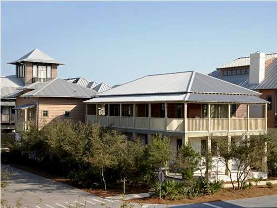 This very Rosemary home is just a few steps from the Beach, Coquina pool, Tennis complex and Town Center. This home is a perfect spot to relax and enjoy all of the amenities of Rosemary beach. Bedrooms are on the 1st level with 10.5 feet ceilings. Living area is on the second level and is open and airy for family activities and fun, all doors open onto a wrap around porch. There are large porches on both levels of the home facing north and west. The kitchen offers beautiful maple wood cabinets, stainless steel appliances and plenty of space for the entire family to gather whether preparing meals together or dining. Oak hardwood flooring can be found throughout the home. The carriage house provides 700 Sq. Ft. of additional living space with oak hardwood flooring, a washer and dryer,