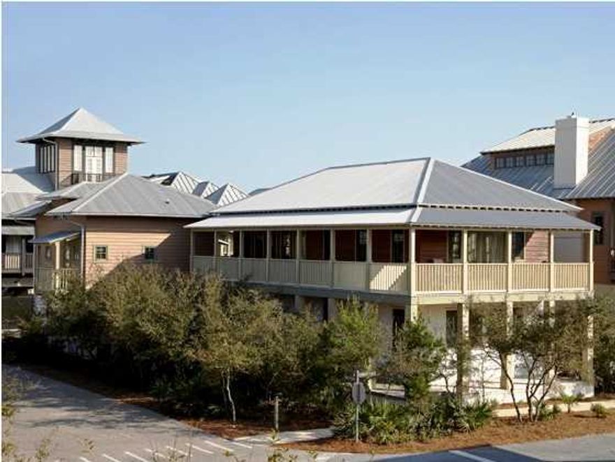 This very Rosemary home is just a few steps from the Beach, Coquina pool, Tennis complex and Town Center. This home is a perfect spot to relax and enjoy all of the amenities of Rosemary beach. Bedrooms are on the 1st level with 10.5 feet ceilings. Living area is on the second level and is open and airy for family activities and fun, all doors open onto a wrap around porch. There are large porches on both levels of the home facing north and west. The kitchen offers beautiful maple wood cabinets, stainless steel appliances and plenty of space for the entire family to gather whether preparing meals together or dining. Oak hardwood flooring can be found throughout the home. The carriage house provides 700 Sq. Ft. of additional living space with oak hardwood flooring, a washer and dryer,