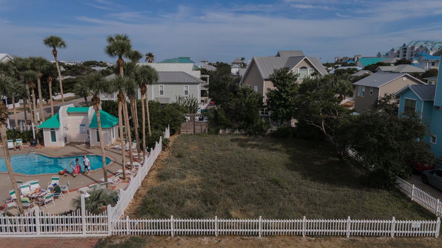 Great opportunity to build home whether for investment or your permanent/second home.one of the few remaining lots in Crystal Shores, a quaint seaside neighborhood, characterized by white picket fences and lots of charm, including a community pool. Just a stone's throw to Camille's Restaurant, known for its excellent sushi and two blocks to World-Class shopping featuring Destin Commons