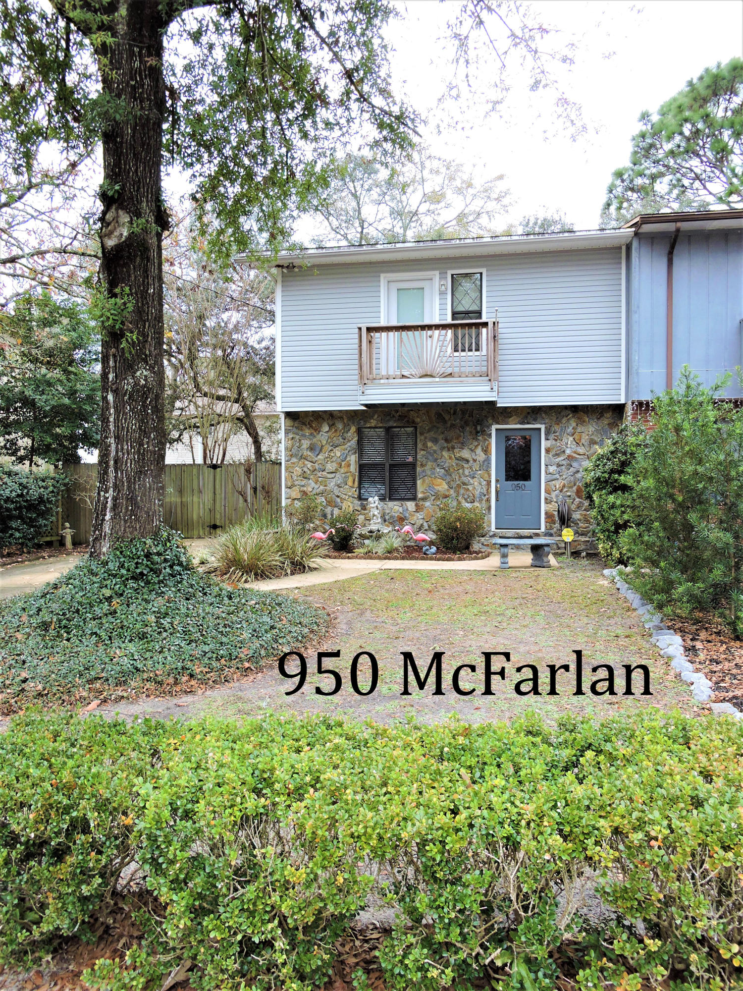 Meticulously loved 2 bed/2.5 bath townhouse has new hardwood flooring, cozy wood burning fireplace, and a backyard retreat! Kitchen has plenty of storage space with under cabinet lighting, complete with electric stove, refrigerator, microwave, and dishwasher. Convenient laundry area on first level comes with washer & dryer. Tiled bath/showers have updated finishes with cultured marble countertops. Spacious bedrooms with lots of closet space. End unit with large fenced in back yard and shed. Centrally located off of Racetrack Road. This home is ready for someone to simply move-in and enjoy!