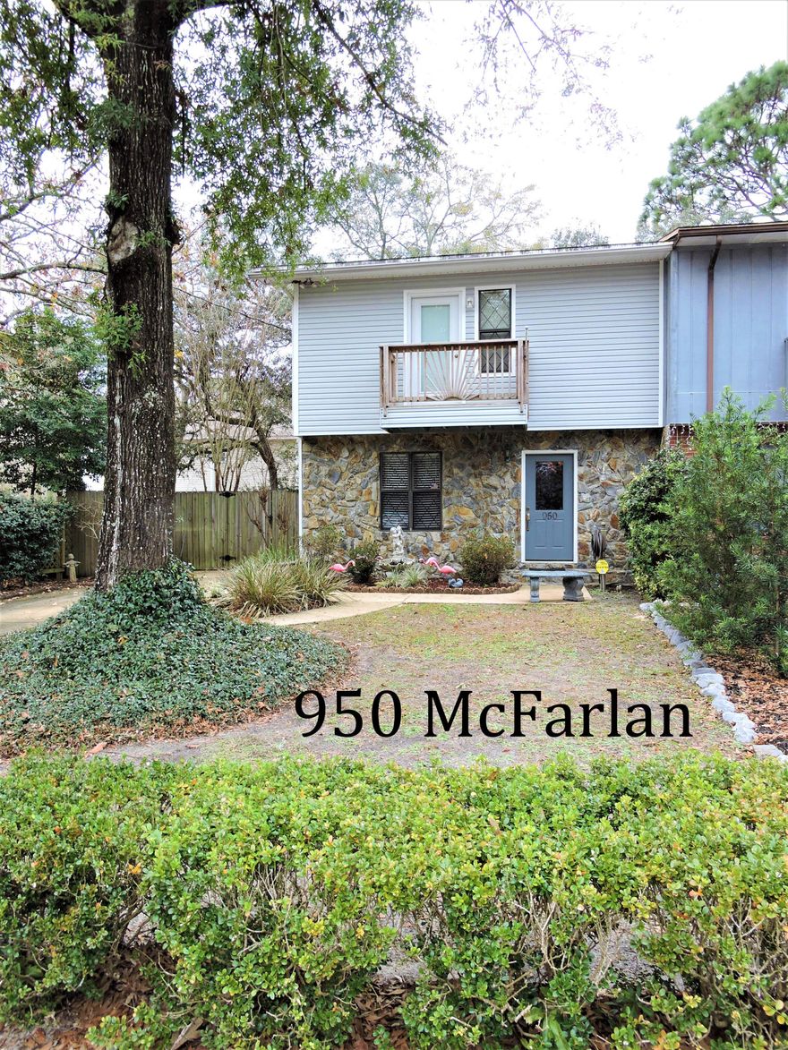 Meticulously loved 2 bed/2.5 bath townhouse has new hardwood flooring, cozy wood burning fireplace, and a backyard retreat! Kitchen has plenty of storage space with under cabinet lighting, complete with electric stove, refrigerator, microwave, and dishwasher. Convenient laundry area on first level comes with washer & dryer. Tiled bath/showers have updated finishes with cultured marble countertops. Spacious bedrooms with lots of closet space. End unit with large fenced in back yard and shed. Centrally located off of Racetrack Road. This home is ready for someone to simply move-in and enjoy!