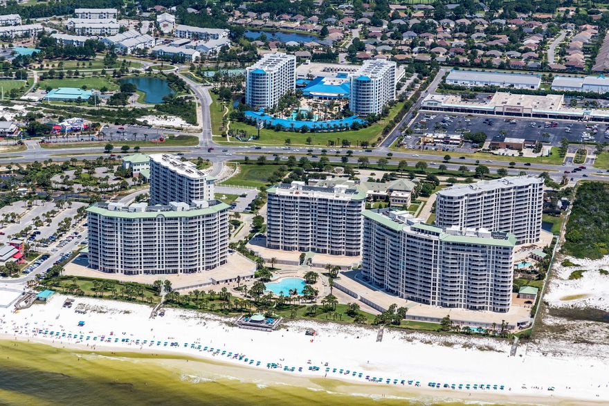 GULF VIEWS + POOL VIEWS! Welcome to the best priced unit at the private + gated beach community - The Palms of Destin! This 6th floor unit has an expanisive private balcony that overlooks15 lush acres and leaves NOTHING to be desired. The chef's kitchen boasts endless ranite countertops, stainless steel appliances, storybook white cabinetry, a customer backsplash + more. The 11,000 square foot, 259,000 gallon zero entry pool is Destin's largest lagoon pool! You'll be blown away by the 5 dancing waterfalls, walking bridges and spacious lounging area. There's a 21,000 gallon heated pool, children's splash area, whirlpool spa + so much more.
The Palms of Destin Resort features a 2,265 square foot state-of-the-art fitness center. The HOA fee covers ALL your utilities! Don't Wait....