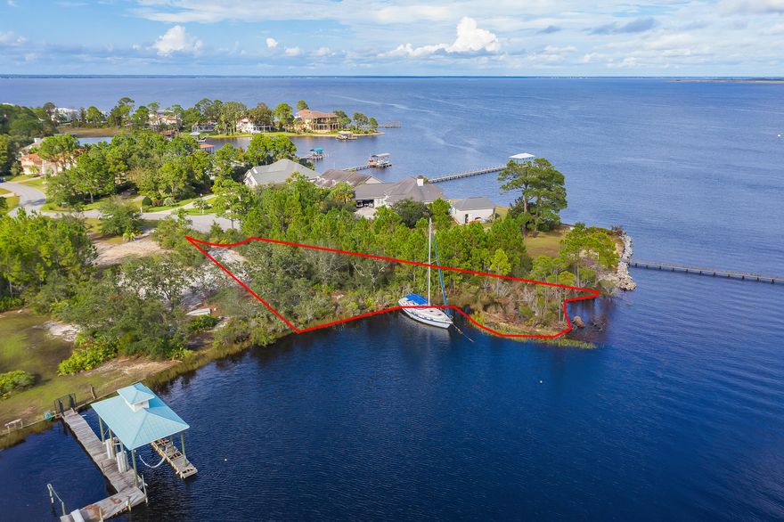 Beautiful waterfront lot located on Shipwreck Circle in the Driftwood area. Deep water access to the Choctawhatchee Bay. Great views and perfect spot for boaters.