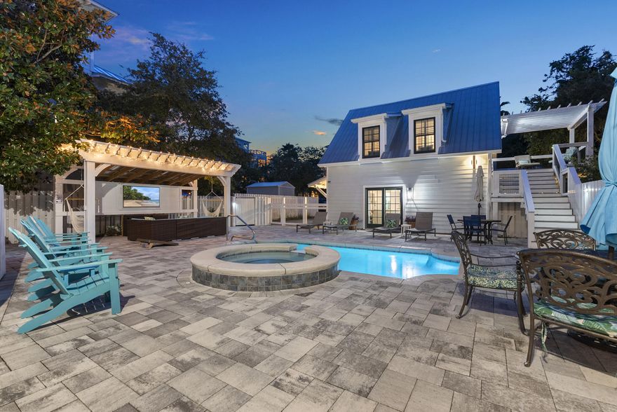 Steps from the Gulf and the rare coastal dune lake where Eastern Lake flows into the ocean, this Seagrove Beach retreat offers two homes on one property, each with its own driveway, centered around a resort-style courtyard with pool and hot tub. The main home features 4 beds/4 baths, while the second house adds 3 beds/3 baths with full kitchen and living. Perfect for multi-generational stays or strong STR performance, the property earned $158K annually prior to renovations with upside potential. Spacious porches, treed privacy, and an unbeatable location make this 7BR/7BA, 3,716 sq ft compound a rare find for either an investment property or home in the heart of Seagrove Beach.