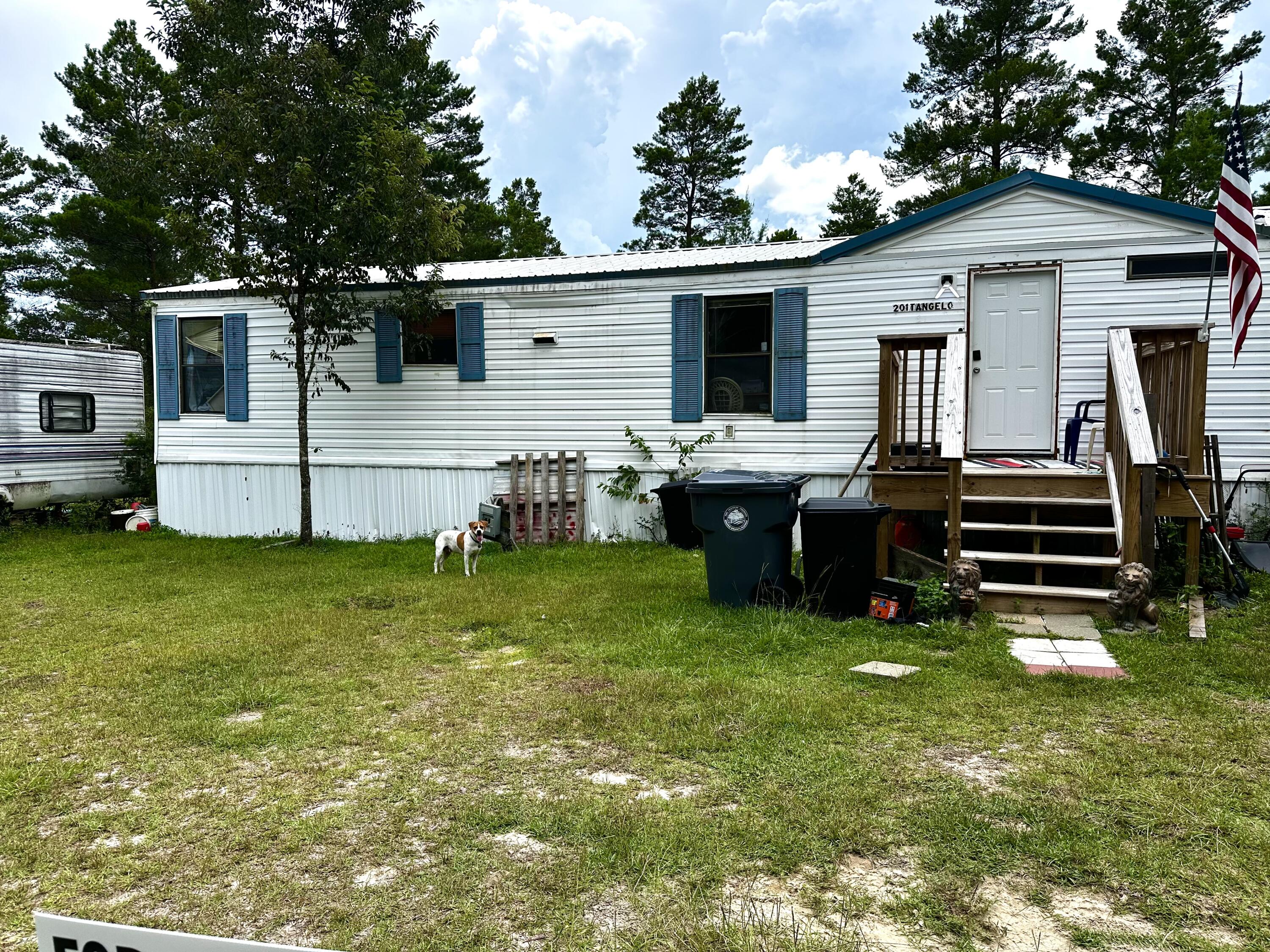 Welcome to your slice of paradise in beautiful DeFuniak Springs! This delightful 3-bedroom, 2-bathroom home sits on a spacious 0.22-acre lot, offering a perfect blend of comfort, space, and small-town charm. Whether you're a first-time buyer, growing family, or someone looking for a peaceful retreat, this property has something for everyone.Located just minutes from historic downtown DeFuniak Springs, you'll enjoy easy access to local shops, schools, parks, and the renowned Lake DeFuniak. With its classic charm and potential for personalization, this home is a fantastic opportunity to invest in one of Northwest Florida's hidden gems. NO APPLIANCES CONVEY IN THE SALE OF THE PROPERTY.