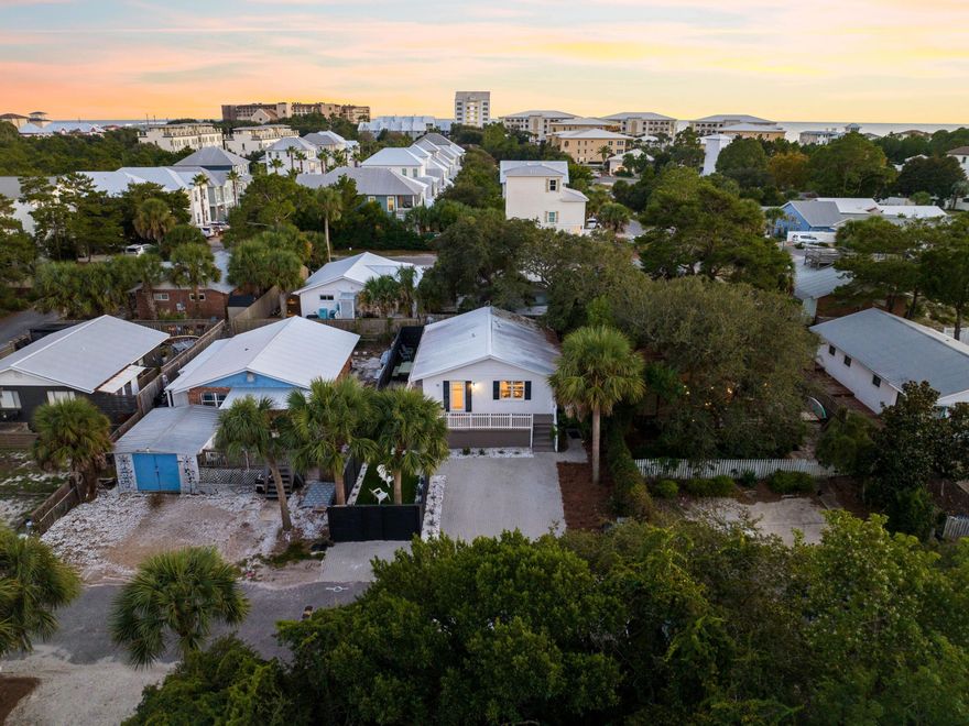 Nestled in the heart of Blue Mountain Beach, just off iconic Scenic Highway 30A, this adorable coastal cottage offers the perfect blend of modern upgrades, charm, and unbeatable walkability. Recently renovated in 2024, this elevated single-story beach house is a true gem--featuring three bedrooms, two full bathrooms, and a private fenced yard ideal for full-time living, a second home, or a high-performing vacation rental. Step inside to find thoughtful design details including wood-look flooring throughout, narrow shiplap ceilings, and a cozy sitting room with a feature wood ceiling and chair rail. The remodeled open kitchen is bright and inviting, offering floating shelves, under-cabinet lighting, a striking glass tile backsplash, and ample floor-to-ceiling cabinetry. Whether entertaining or relaxing after a beach day, the layout and finishes are both functional and stylish.

Unlike many homes in the neighborhood, this cottage includes two full bathrooms and an indoor washer/dryerproviding added convenience for guests or long-term stays. With sleeping accommodations for 6 and the ability to sleep up to 8 with a pull-out sofa in the living room, it's perfectly suited for short-term rentals.

Outdoors, enjoy a private deck for dining and grilling, a lush backyard with grass and tropical plantings, and a generous brick-paved parking pad out front. The home is quietly situated in the middle of the neighborhood, offering privacy and no through trafficyet it's just a 3-minute walk to local favorites like Mimmo's, McTighe's, Redfish Taco, and Cowgirl Kitchen.

Additional highlights include a newer roof, updated HVAC system, and no HOA restrictions, offering both peace of mind and flexibility for ownership.

Located just half a mile from the beach, this charming Blue Mountain retreat offers an unbeatable opportunity to own a move-in-ready coastal home in one of 30A's most beloved neighborhoods.