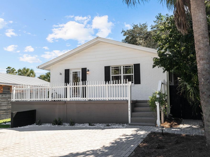 Nestled in the heart of Blue Mountain Beach, just off iconic Scenic Highway 30A, this adorable coastal cottage offers the perfect blend of modern upgrades, charm, and unbeatable walkability. Recently renovated in 2024, this elevated single-story beach house is a true gem--featuring three bedrooms, two full bathrooms, and a private fenced yard ideal for full-time living, a second home, or a high-performing vacation rental. Step inside to find thoughtful design details including wood-look flooring throughout, narrow shiplap ceilings, and a cozy sitting room with a feature wood ceiling and chair rail. The remodeled open kitchen is bright and inviting, offering floating shelves, under-cabinet lighting, a striking glass tile backsplash, and ample floor-to-ceiling cabinetry. Whether entertaining or relaxing after a beach day, the layout and finishes are both functional and stylish.

Unlike many homes in the neighborhood, this cottage includes two full bathrooms and an indoor washer/dryerproviding added convenience for guests or long-term stays. With sleeping accommodations for 6 and the ability to sleep up to 8 with a pull-out sofa in the living room, it's perfectly suited for short-term rentals.

Outdoors, enjoy a private deck for dining and grilling, a lush backyard with grass and tropical plantings, and a generous brick-paved parking pad out front. The home is quietly situated in the middle of the neighborhood, offering privacy and no through trafficyet it's just a 3-minute walk to local favorites like Mimmo's, McTighe's, Redfish Taco, and Cowgirl Kitchen.

Additional highlights include a newer roof, updated HVAC system, and no HOA restrictions, offering both peace of mind and flexibility for ownership.

Located just half a mile from the beach, this charming Blue Mountain retreat offers an unbeatable opportunity to own a move-in-ready coastal home in one of 30A's most beloved neighborhoods.