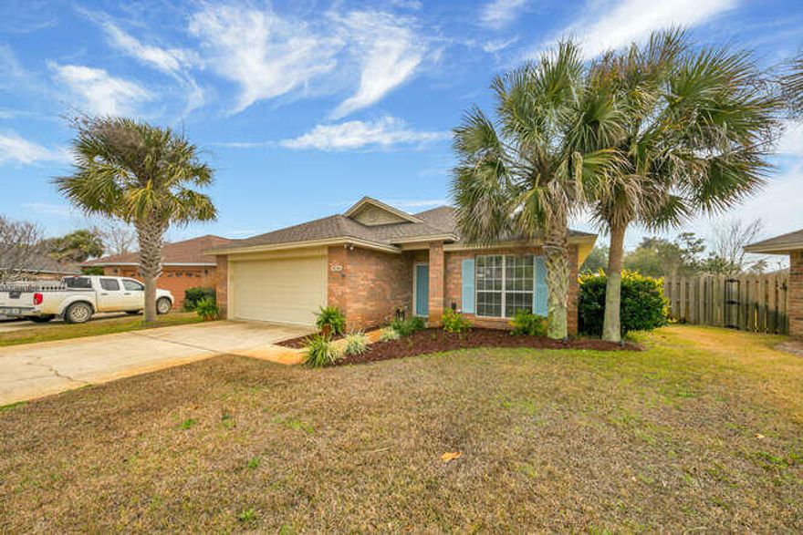 Beautiful ALL Brick Home located in Indian Lake. Situated on a cul-de-sac lot, the fenced in backyard is HUGE with plenty of room for a pool and offers plenty of additional space for outdoor living. This home has been very well maintained and has been recently updated. Spacious bedrooms with walk in closets. A few of the updates include front glass storm door, rear glass doors which open to the covered porch, new blinds, ceiling fans and light fixtures, beautiful new granite kitchen countertops, new dishwasher, garbage disposal, master bedroom windows, new LVP flooring and interior paint. New Barn door to the laundry room, and new interior HVAC system.   Guest bath has been totally updated with new tub, toilet, vanity, and tile flooring. Roof was replaced in 2018.