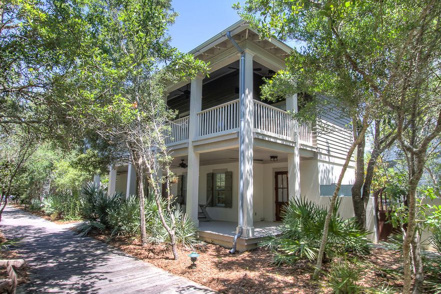 A great location in Rosemary Beach with boardwalks on two sides of the property and in close proximity to the beach, pools, fitness center, tennis complex and the new Owner's Club and Pool. This home features custom woodwork and carpentry throughout. On the first floor of the home, you'll find three guest bedrooms located just off a main foyer area. The first room features two sets of custom built-in bunk beds with a private bathroom. Located just down the hall are two additional guest rooms with a shared bathroom. All baths feature tile floors and marble counter tops. One room features a queen bed and the other a king bed. The rooms are painted in soft coastal colors. There is a large laundry room conveniently located on the main floor with a full size washer, dryer plus storage cabinet