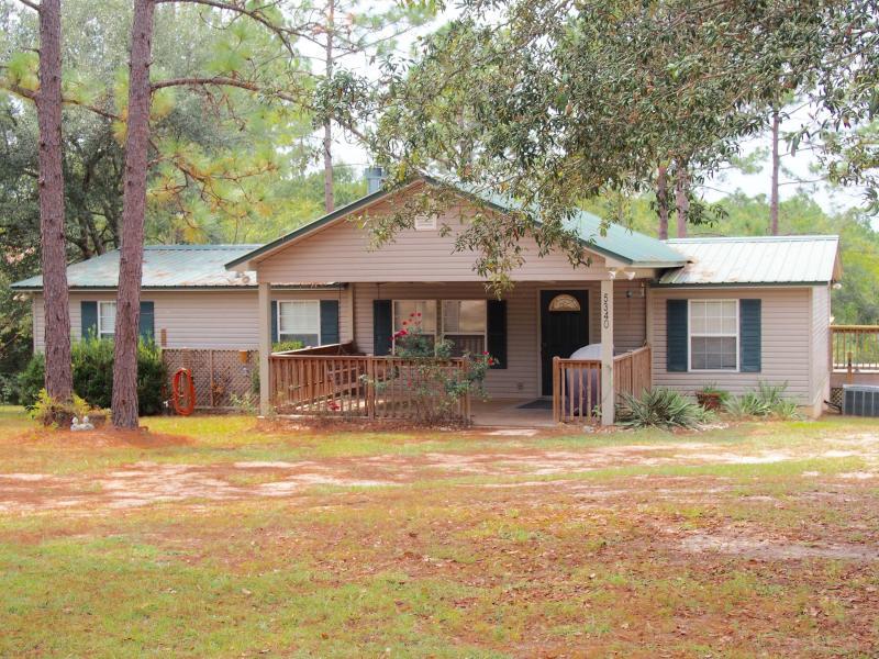 If you love the country life and fishing this Lakefront home is just for you. Large lot which gives privacy. Lots of room for entertaining with 2 beautiful fireplaces in living room and den. Roomy kitchen with pantry. Home has a very large Den area lined with windows so you won't miss out of the view of the Lake. Side deck for grilling and relaxing. Underneath the backroom has a large 624 sqft workshop There is 2 additional sheds located near the dock. Lots of room for the outdoors family that loves to have all their toys on their property. Make this awesome home yours today. Buyers should verify all measurements deemed to be accurate.