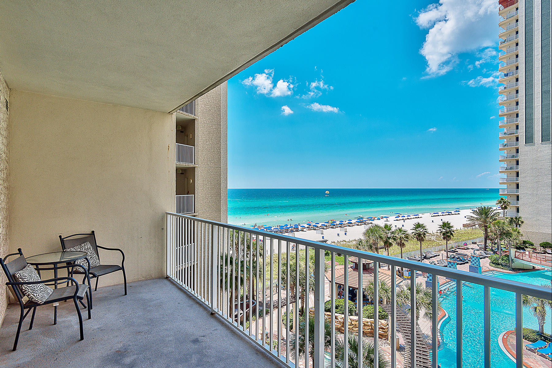 Gulf views abound from this amazing one-bedroom, two-bathroom, plus bunk room, condo at the Shores of Panama in Panama City Beach, FL. This amazing condo grossed more than $37,000 in rentals for 2014, with more than $31,000 on the books for 2015. This condo also has a parking space in the garage on the 5th floor. When you enter this condo, the master bedroom is off the hallway. The master has ample closet space and an en suite bathroom. A bunk room is off the hallway and has access to a separate full bathroom. There is a stackable washer and dryer in the unit as well. Relax on the balcony and enjoy a cocktail while gazing at the emerald waters of the Gulf of Mexico. This condo will be sold furnished and will be ready to rent, enjoy as a vacation home, or live in full time.