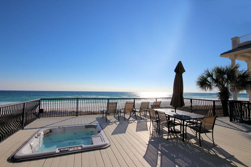 REDUCED for immediate sale! Amazing Luxury Beach Front Residence with plenty of upgrades including a HUGE deck with a sunken hot tub and panoramic views of the quiet, peaceful, white sandy beaches of Destin. This Beach House is immaculately maintained & decorated. Newly painted exterior and interior done in 2013. The Gulf side of home has new impact windows. You enter the home to a lovely court yard with fountain. The lot continues to the water and is one of few privately owned beaches. The kitchen is modern with gas cook top and desk area. Appliances are stainless & new. The air/heat units new this year. The two garages are extra large and deep.