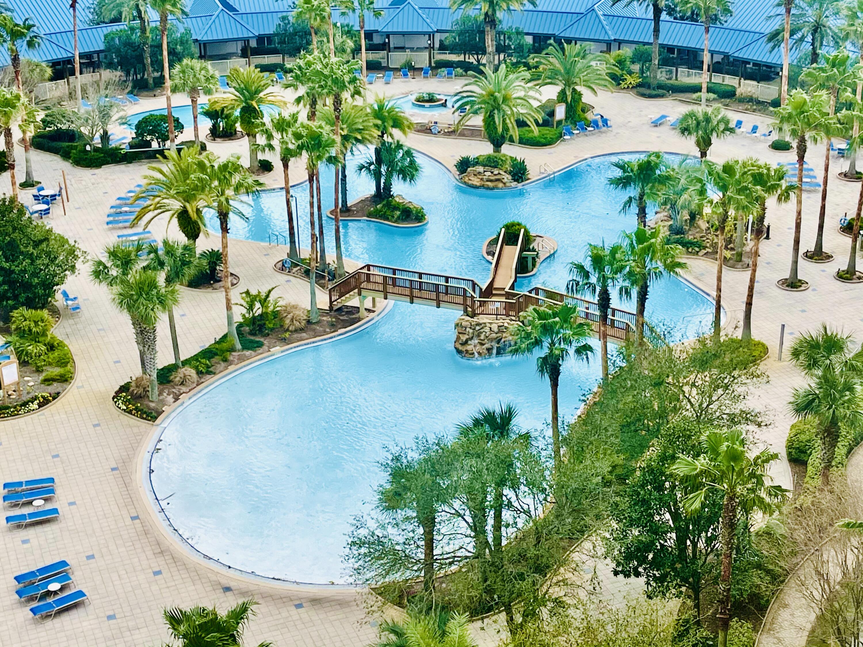 Come experience the Ultimate Florida Lifestyle in this 5 star resort. Located in a highly desired location that is walkable to many restaurants, and across from Gulf of Mexico. The Palms of Destin offers amenities galore, with an 11,000 square foot Lagoon Pool deck w/ waterfalls. Children's Pool, Playground, Tennis Court/ Pickleball and Basketball court, Sports Lounge, Coffee Bar, poolside bar, Free shuttle. Suite has beautiful views of Henderson State Park and the Gulf of Mexico! End units have 2 balconies for relaxing. With upscale furnishings and coastal Inspired decor. The Master has a king bed, with en-suite bath. A queen in the second guest room with a queen sleeper sofa. Second bath has walk in shower. Similar units gross $65K in rental income, All Utilities included in COA.