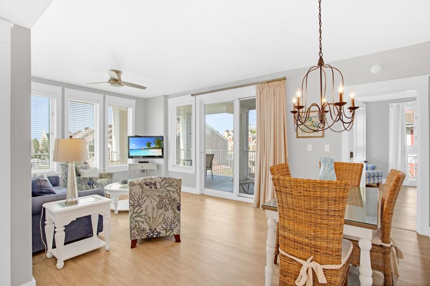 Highly desirable corner unit with wrap around balcony right in the heart of The Village of Baytowne Wharf. This 2 bedroom 2 bath Observation Point condo features a coastal chic decor, tastefully appointed furnishings, wall to wall LVT flooring, upgraded fixtures, updated master bath with Carrera marble counter top and fresh painting throughout.  The kitchen with granite counter tops, opens to the large breakfast bar and the dining and living areas which offer ample windows allowing for lots of sunlight.  The balcony offers a spacious outdoor living space where you can enjoy the sights and sounds of The Village, stunning fireworks displays and peek-a-boo view of the bay. This unit is conveniently located on the 4th floor Founder's Club level.  The Founder's Club is a privately keyed suite-