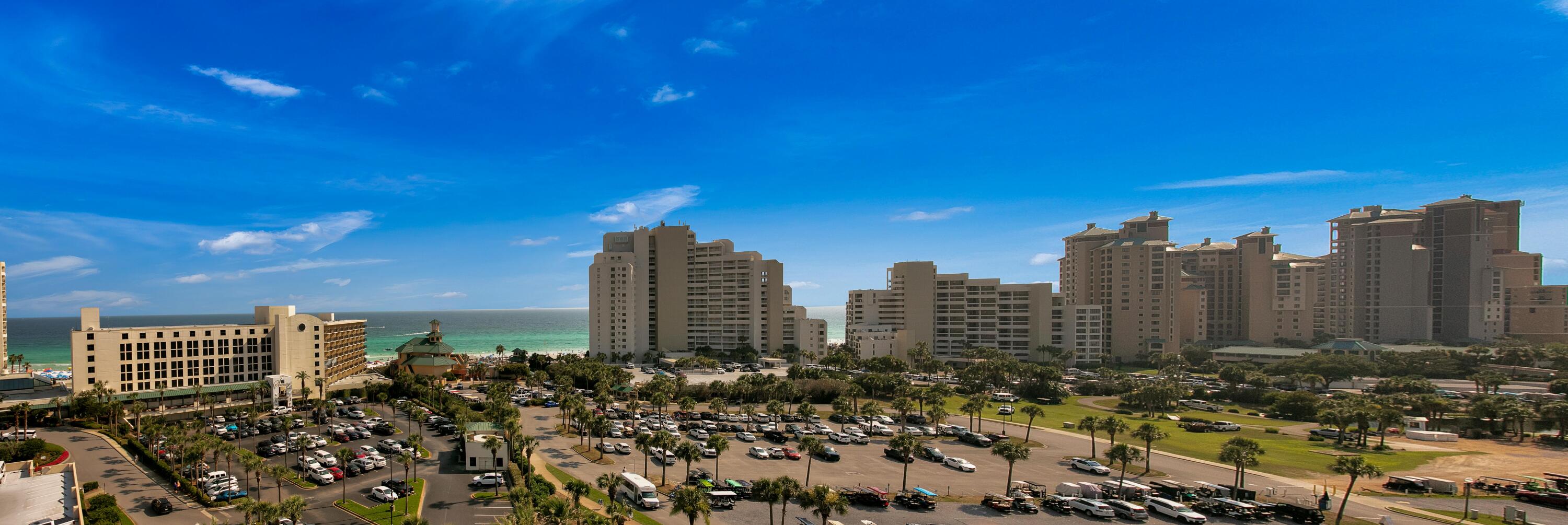 This 7th floor two-bedroom lock-off unit in Luau II provides a coastal retreat with breathtaking views of the Gulf of Mexico, tranquil sounds of the waves and captivating sunsets from the wrap-around deck.The living area is bathed in natural light, thanks to expansive windows that showcase the mesmerizing Gulf views and Luau lagoon style pool with swim-through waterfall.Luau II is only about 800 ft. to the pristine sugar white sand beaches and emerald waters of the Gulf of Mexico.This two-bedroom lock-off, can be rented three ways: studio, one-bedroom, two-bedroom unit. Studio: new HVAC, water heater(2023), furniture. One-bedroom: new tv(2022) window treatments (2022)This unit is a short-term rental property and may be subject to rental reservations made on or before