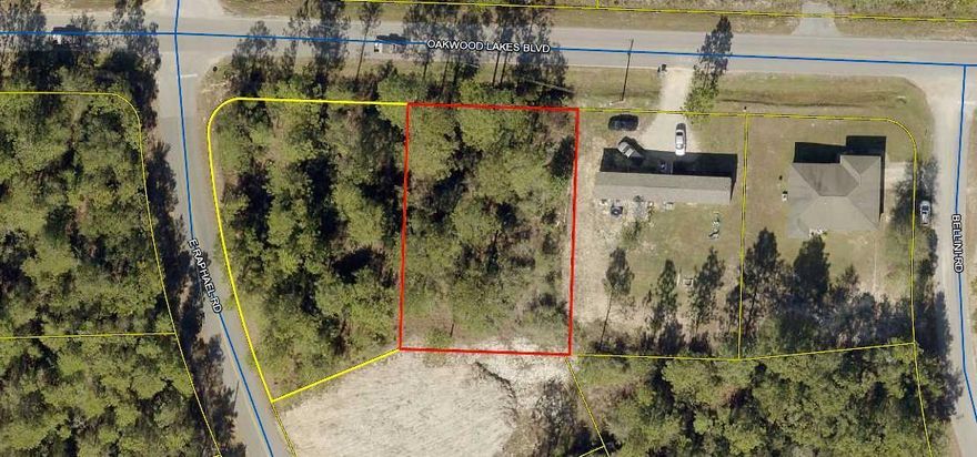 GREAT BUILDABLE LOT! Wooded lot. Build your new home or bring your mobile home. Tap fee has been paid and land has been surveyed. Call for a showing today!