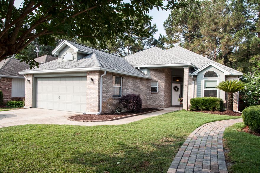 Leave the hustle & bustle of Fort Walton Beach behind as you drive through beautiful Crosswinds Landing to your new home! Located on a quiet cul-de-sac this spacious, open floorplan features soaring ceilings and a freshly painted interior. Enjoy afternoons & evenings in the privacy of your backyard from the covered patio as you listen to the frogs in the wooded lot beyond the fence and awake to relaxing sounds of the birds singing. Kitchen & Greatroom are perfect for entertaining and the gas fireplace provides ambiance on cooler evenings. Highlights of the remodeled master bathroom include a tile shower, dual shower heads, whirlpool tub & double vanity. Custom shelving in closets & garage. Roof replaced in 9/2013; exterior to be painted 5/2018. Well water source for lawn pump & sprinklers--no county water expense! Complete with hurricane coverings for windows & doors.  Conveniently located between Eglin AFB and Hurlburt Field.  Close to shopping and hospitals.