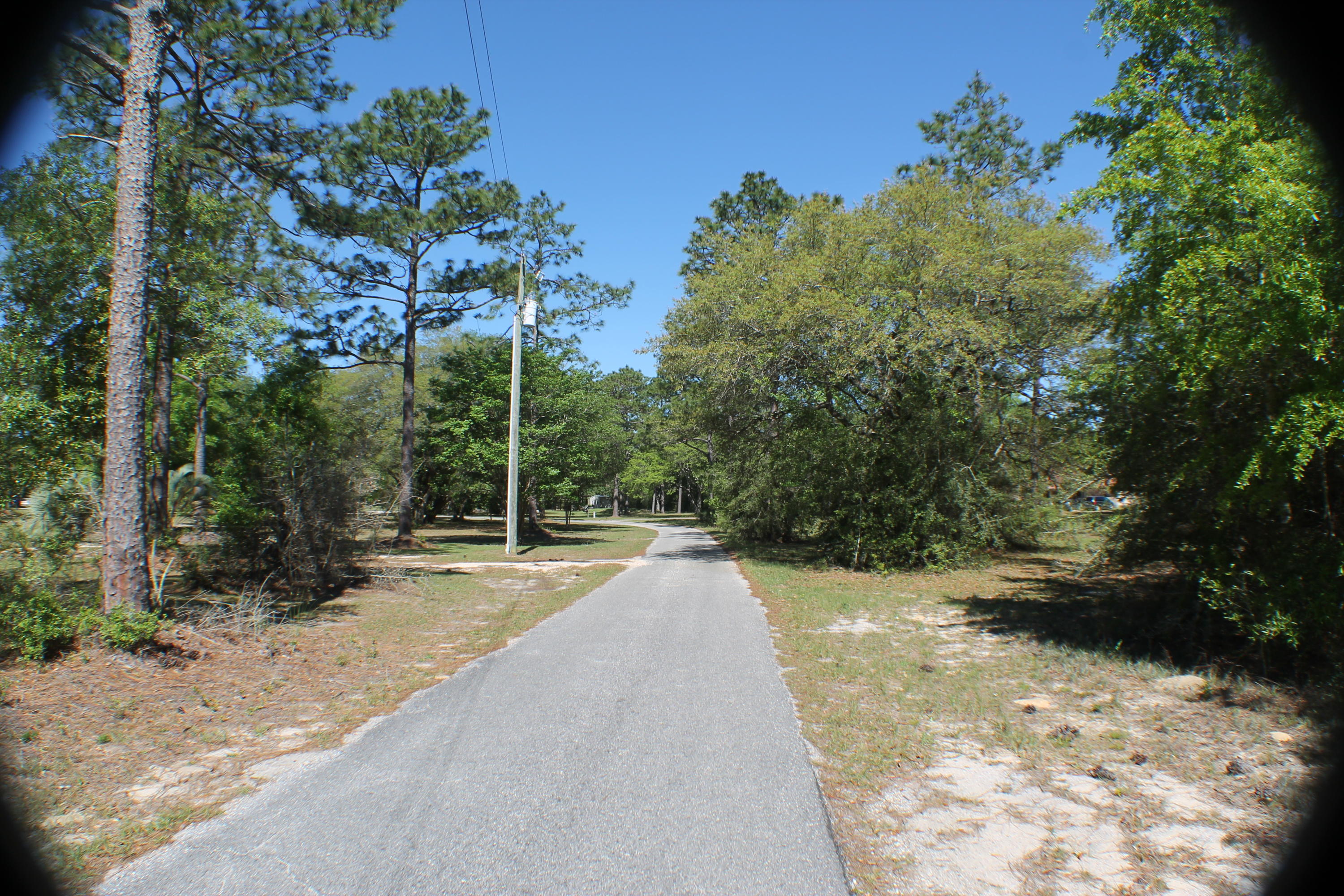 Bring your house plans!! 5.91 AC level ground to build you dream house!! Lovely neighborhood and additional land available!!