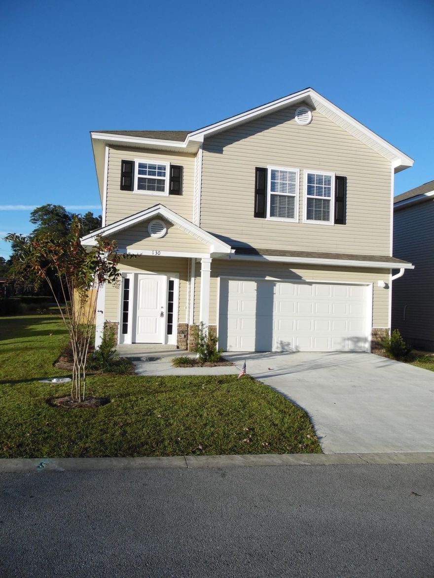 New construction! Granite counter tops and vanity tops, separate master shower and garden tub, stainless appliances, hardwood floors downstairs, and a screened back porch. The guest bath features a double vanity and shower/tub combo. Very large laundry room with utility sink and cabinets. Fully fenced yard, sprinkler system and two car garage! Ready for move-in!