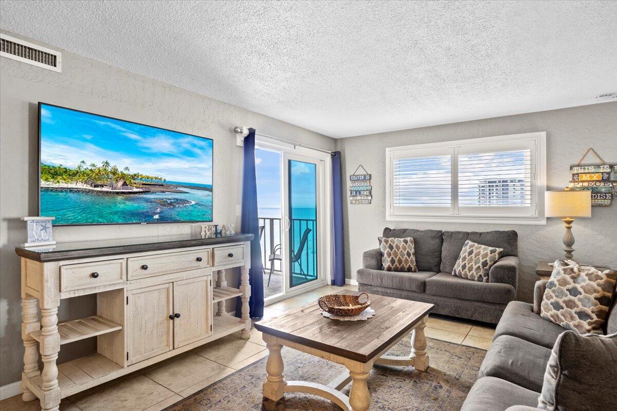 Open House! Saturday 9/6/25 from 11:30am-2pm. Experience beachfront living at its best in this beautifully updated, fully furnished 3-bedroom, 2-bath condo in Panama City Beach. Perched on the 10th floor, this coastal retreat offers tile flooring throughout, a modern kitchen with quartz countertops and soft-close cabinetry, and a spacious living area that opens to a private balcony with stunning panoramic Gulf views. The master suite also features balcony access and an upgraded en-suite with a tiled walk-in shower. Move-in ready and tastefully decorated with quality coastal furnishings, this unit combines comfort and style. Community amenities include two beachfront pools, a hot tub, fitness center, game room, picnic areas, and direct access to the sugar-white sands--all within a gated complex with 24-hour security. Ideally located near St. Andrews State Park, top dining spots, and local attractions. Don't miss your opportunity to own a piece of paradise on the Emerald Coast. Rental projections $54,202.50 - $59,582.73 the first year!!
