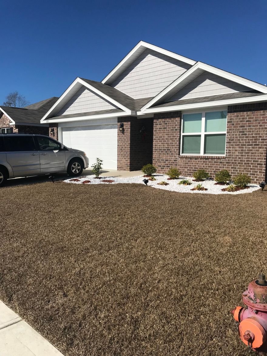 Contemporary all brick home.  4 bedrooms and 2 full baths. Built in 2020 this neighborhood features sidewalk, street lights and underground utilities.
The kitchen and dining room flow into the spacious living room. Kitchen is equipped with stainless appliances and large island.
Master bath has a double vanity, 5' shower, linen closet and walk in closet.
Split bedroom plan. Living area leads to covered patio and nice sized back yard.  Call for your appointment to view this home.