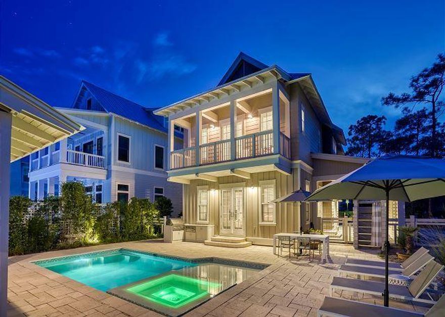 This elegant home has a contemporary coastal design throughout and situated on an over-sized lot in Watercolor with a large pool spa, sunbathing area & covered outdoor TV space complete with gas lanterns & firepit.  The large lot allows for a detached garage and covered parking. The interior has an open living area alive with natural light. There is also a bunkroom on the 2nd floor. Sold furnished.