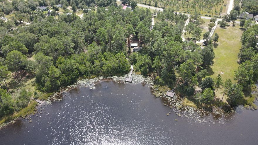 Lake front property. Perfect homesite for your fishing enthusiast. 45 Minutes to the beach, even closer to the Choctawhatchee Bay, and even closer to many rivers and creeks.