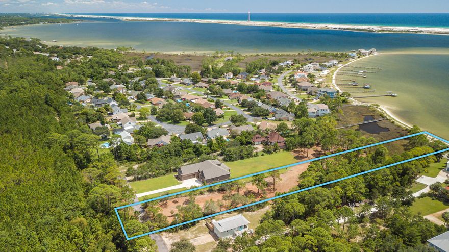 Stunning views and all the privacy a 2 acre lot provides! This residential land lot is perfect for your dream home build with 103 feet on the water! Best news is front part of lot is located in Flood Zone X. Stunning homes all along this private, secluded street. The waterfront footage has sandy shores and clear water. Current wetlands study and option for permitting the dock available. This is the property you have always wanted to live on!