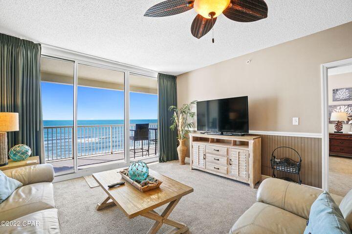 BEST OF THE BEST IN PCB! RENTAL POWERHOUSE! EXCELLENT ELEVATION! Almost 1600 square feet of seaside luxury with a toes-in-the-sand location on the stunning beaches of Panama City Beach. Few places can capture the magic of the Emerald Coast and the beaches of Panama City Beach. This fantastic, immaculate, and highly coveted 4bed/3bath unit in the premier Majestic Beach Towers does. Sited in a prime eleventh floor location in the building to afford the most breathtaking coastline and sunset views, this condo exudes beachy charm with the eminent income producing floorplan and beachy chic style! An expansive balcony offers endless view of the Emerald Coast and is accessed from the living room and master suite providing the ultimate alfresco living and entertaining environment.
