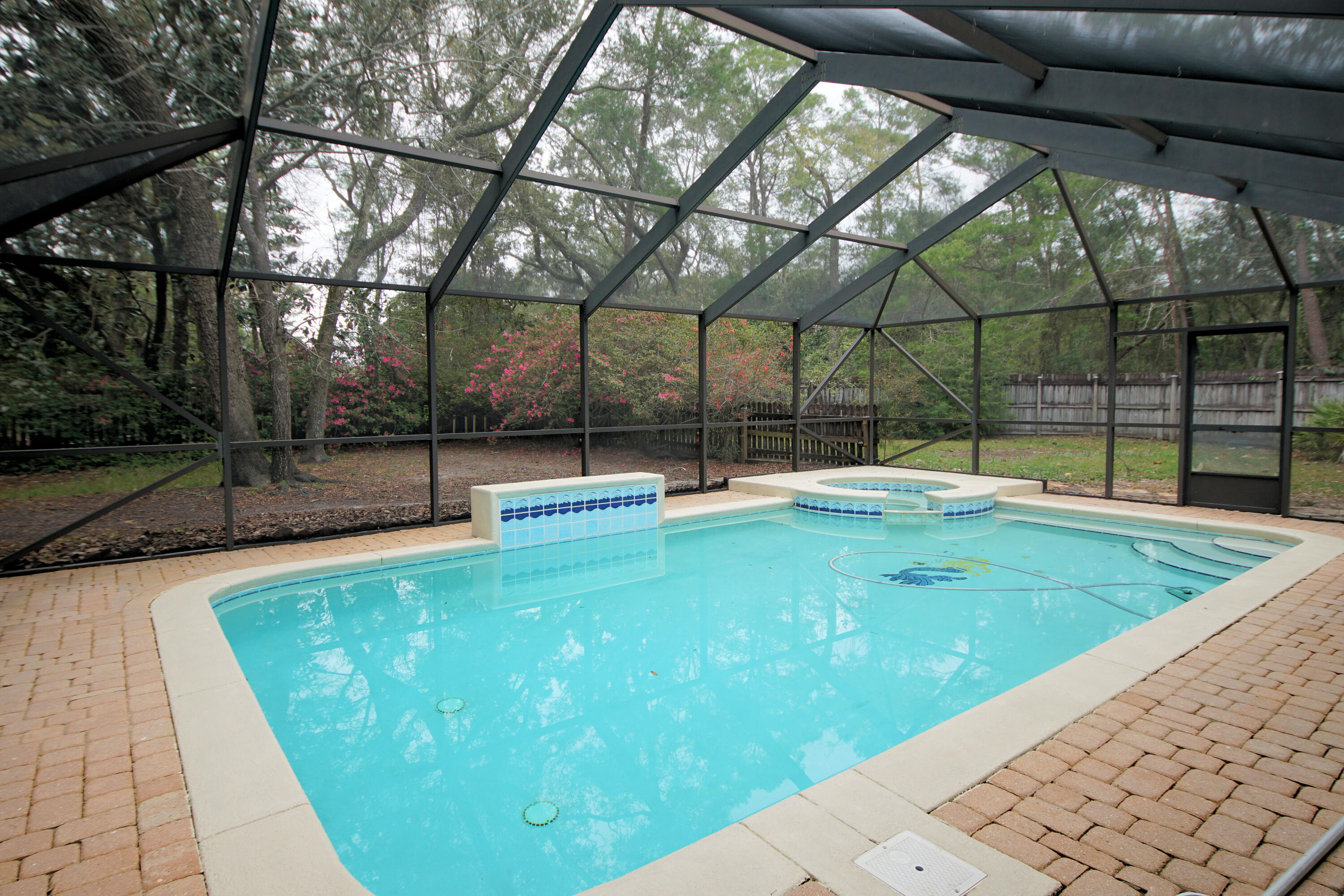 This 5 Bedroom 3 Bathroom POOL Home in Blue Water Bay is a must see! The home sits on a large .58 acre lot in the Lido Village neighborhood. Amenities include the Tennis center, Golf, Heated Rec pool, & the Marina. NO HOA! Home Features include a NEW 2021 ROOF, Tongue and groove ceiling & wall, over sized 2 Car Garage, a brick paved driveway, Two living Spaces, Large kitchen, Florida Room, A Pool/Hot tub with a screen enclosure & brick pavers, Gutters, and MUCH MORE! The room sizes are impressive and there is an abundance of closets and extra storage space. This home has been well maintained by very thoughtful owners. Call to schedule your showing!