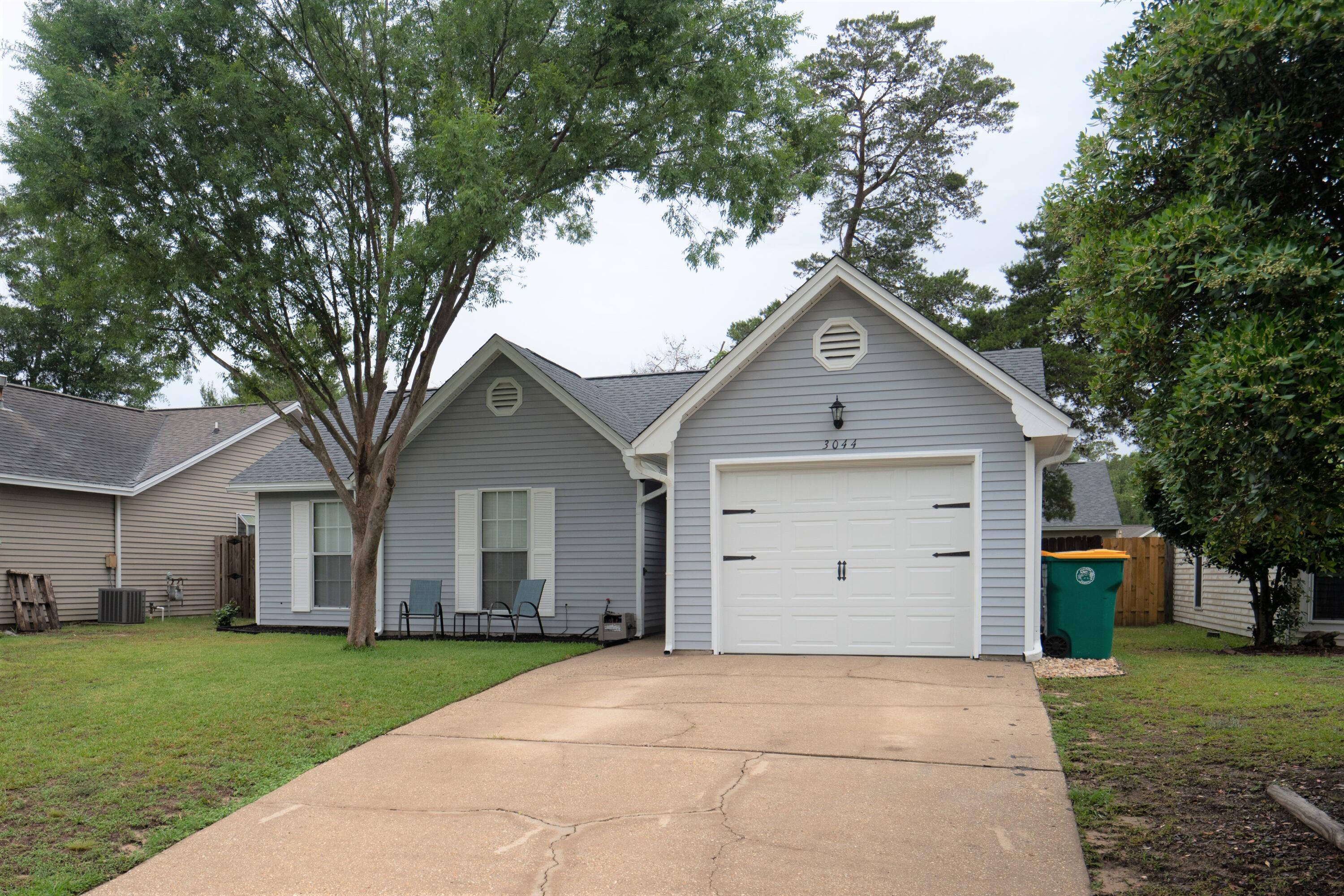 You will want to see this adorable, well maintained and updated, home in Bluewater Bay. New roof (May 2022), Gas Water Heater (2018) and HVAC (2010). Conveniently located close to the beaches of Destin, Eglin AFB, Hwy 293 (bypass) local schools, shopping, and dining. Upon entering the home you are greeted with a beautiful living space that is connected to an enclosed 150 sq. ft. porch, perfect for Florida indoor/outdoor living. Once you are in the home, the updated kitchen (subway tile backsplash and stone countertops) and dining space are to your right and the 3 bedrooms and updated bathrooms are to your left.  This would make a great rental property, starter home or for those looking to downsize. TV's and cameras do not convey with home. Buyer to verify all information deemed important.
