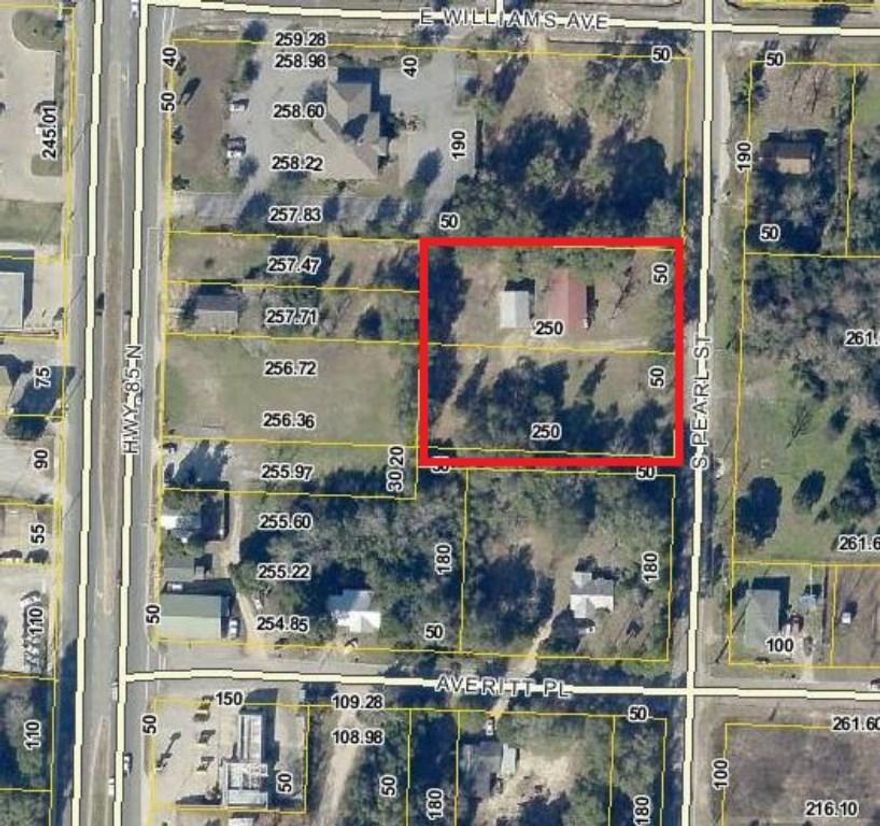 1.20 ACRES of LEVEL Commercial Property located off of HWY 85 South; South Easterly Behind Trustmark Bank. Visibility from Hwy 85! Existing 1,753 sq.ft. home/building and a 30 x 23 Garage with Electrical. Property is well maintained with mature landscaping. Ready for the NEW Owner/Investor!