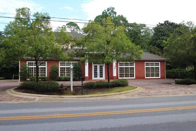 This is a rare opportunity to own a freestanding commercial office building with private dedicated parking on a corner lot with over a third of an acre in Santa Rosa Beach for under $1,000,000. Great visibility on County Hwy 393 with this class A office building consisting of 8 offices, conference room, large space for cubicles if desired, waiting room, and warehouse with roll-up door. High-end finishes throughout: 10-foot ceilings, 8-foot doors, crown molding, and all tiled floors. Offices fully wired with alarm system, telephone system, and CAT-5 wiring. Office space is 2,092 SF and warehouse is 1,080 SF. New AC just installed. The opportunities are endless with flex options available, the 24 ft. tall warehouse ceilings would allow the new owner to convert to a second floor if needed.