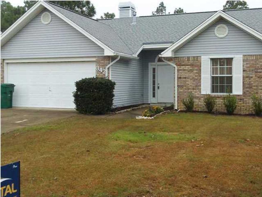 Enjoy and relax in this very nice home that backs up to Eglin Reservation with your screened in back porch! With an open floor plan, you can enjoy family and friends easily; cathedral ceilings in the living area and master bedroom; beautiful wood burning, stone fireplace in the living room; double vanities in the master bath along with an enjoyable garden tub; extras include double car garage with electric opener and keypad entry, lawn sprinkler system, natural gas water heater, and ceiling fans. This home has been lovingly cared for - all we need is you! Medium pets allowed.