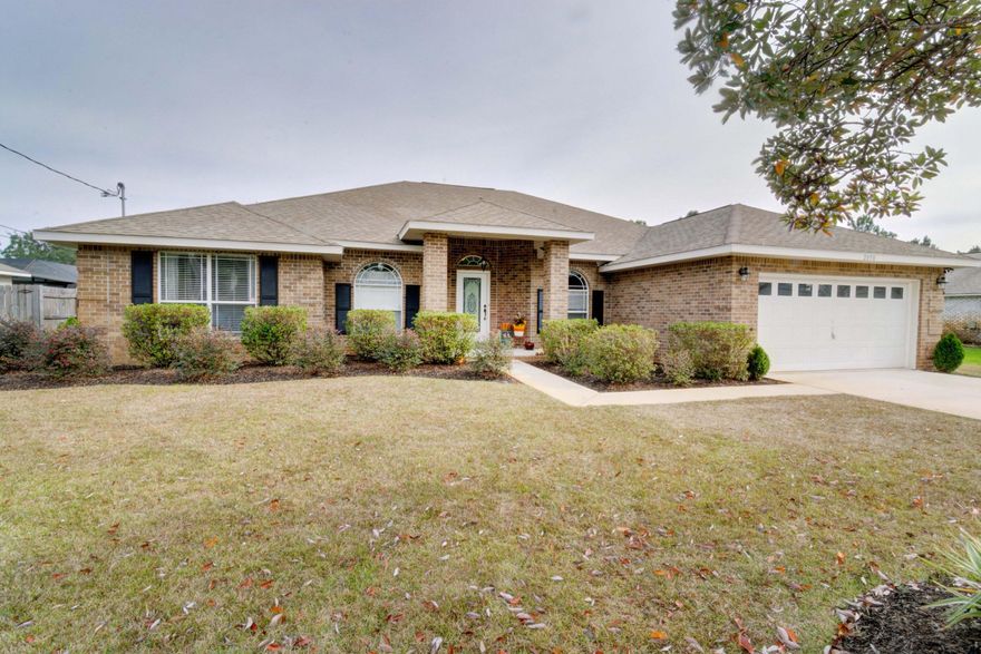 This beautiful all brick 5 bedroom home is nestled in the desirable Holley By The Sea subdivision! A large foyer cheerfully welcomes you in and leads you to the open living area with new flooring, new paint, and a fireplace perfect for creating a relaxing ambiance. The kitchen comes complete with granite counters, large island, a new Whirlpool French Door refrigerator and has it's own eat-in area. A separate dining room is available for hosting gatherings or for enjoying that intimate dinner.The Master Bedroom is large with trey ceiling, huge mater bathroom with granite counters, his and hers vanities, garden tub, separate shower and a huge walk-in closet. Having 4 additional rooms make it perfect for kids, guest room, office space, playroom...