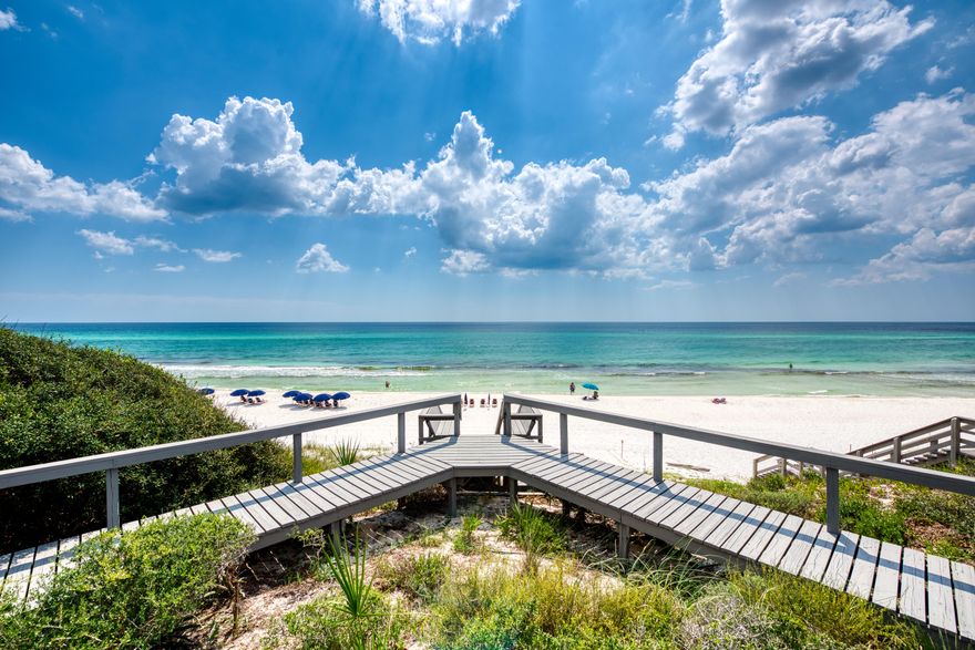 Loved by countless vacationers on the beautiful Emerald Coast, and known simply as ''The Beach House,'' this gulf-front Seacrest beach bungalow features 90 feet of waterfront, private beach access, and forever panoramic gulf views. Recently renovated with desirable coastal aesthetics, updates include a full kitchen remodel with stainless steel appliances and a breakfast bar; beautiful tile showers and granite countertops in all four bathrooms; a fresh coat of paint; and new flooring throughout. This bright beach home offers an open floor plan and inspiring views of the Gulf of Mexico from the main living areas, as well as from three of the four bedrooms. A large outdoor deck provides a perfect place to enjoy sunrises and sunsets over emerald green waters, while a private walkway will lead.