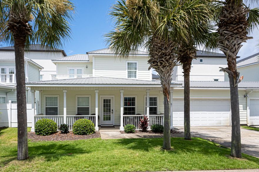 Miramar Palms is located only a minute or two from the beach! Hardi-plank siding, metal roof, oversized double garage, covered front porch, open balcony, plus a back patio area with outdoor shower. Completely furnished & just one block to the beautiful Destin beaches, this would make an ideal primary, second home or vacation rental. The home features tiled floors in family room, kitchen & baths. Kitchen features stainless appliances, solid surface countertops, large pantry, powder room & access to the back yard patio area ... great for grilling. First floor master suite; spacious bath with double vanity, garden tub, separate shower & large walk-in closet. Upstairs there are 2 bedrooms, one with French doors to a large private balcony with ample room for table & chairs or lounge The home also features a covered front porch, perfect for that morning coffee, while the back patio is perfect for grilling and entertaining guests.  The oversized double garage provides ample storage for two vehicles as well as beach gear and the outdoor shower makes for easy clean up from a day at the beach. Located in the heart of Miramar beach this townhome is centrally located with shopping, dining and entertainment just minutes away!